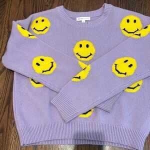 Smiley face purple sweater